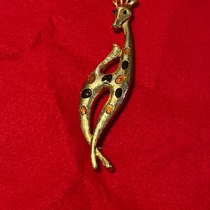 Source Unknown Gold and Black Giraffe Brooch
